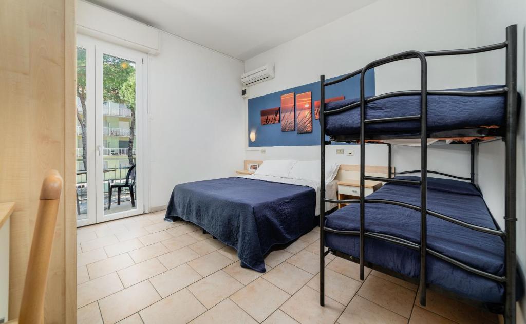 Postel nebo postele na pokoji v ubytování HOTEL OLIVER
