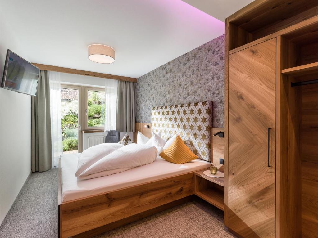Postel nebo postele na pokoji v ubytování Apartments Schöne Aussicht