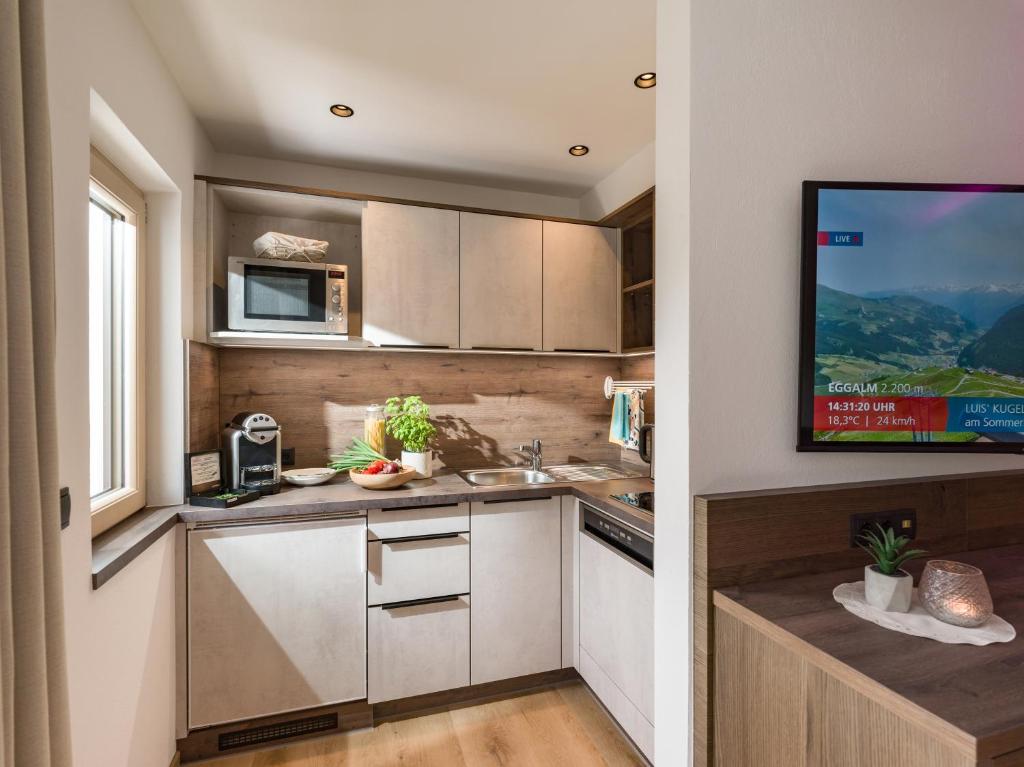 Kuchyň nebo kuchyňský kout v ubytování Apartments Schöne Aussicht