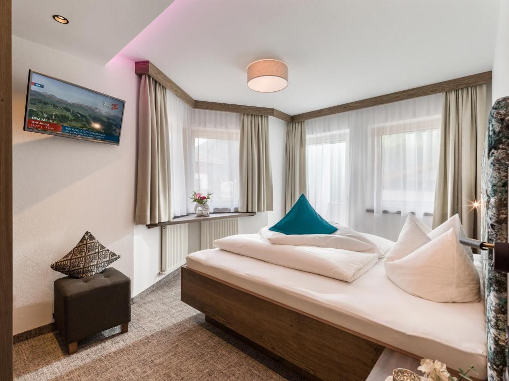 Postel nebo postele na pokoji v ubytování Apartments Schöne Aussicht