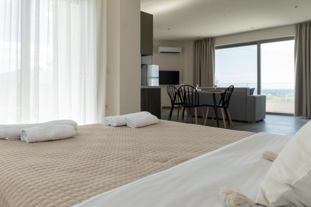 Postel nebo postele na pokoji v ubytování Oliva Verde Residences