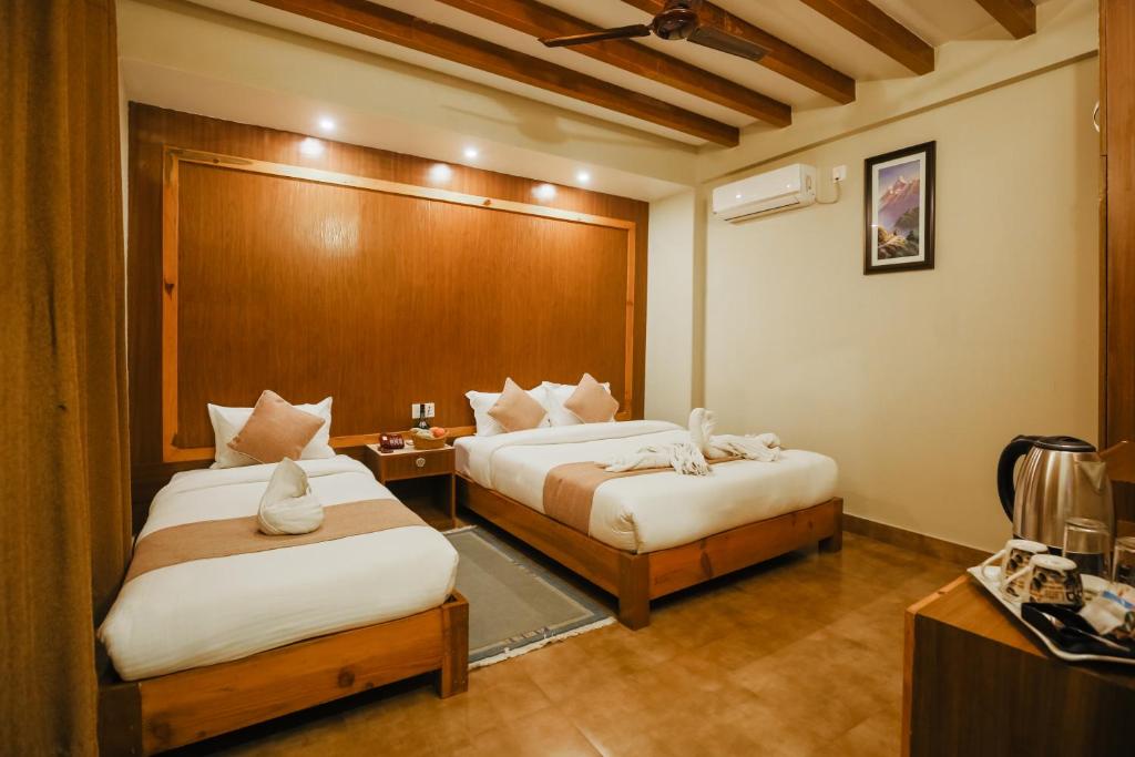 Letto o letti in una camera di Paradise Boutique Hotel