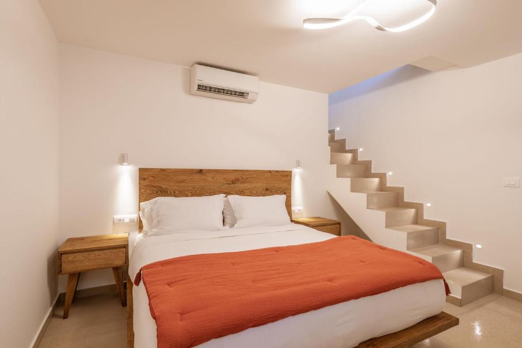 Postel nebo postele na pokoji v ubytování Aya Sofia Suites