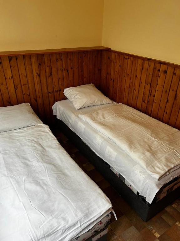 Postel nebo postele na pokoji v ubytování Penzion Anička