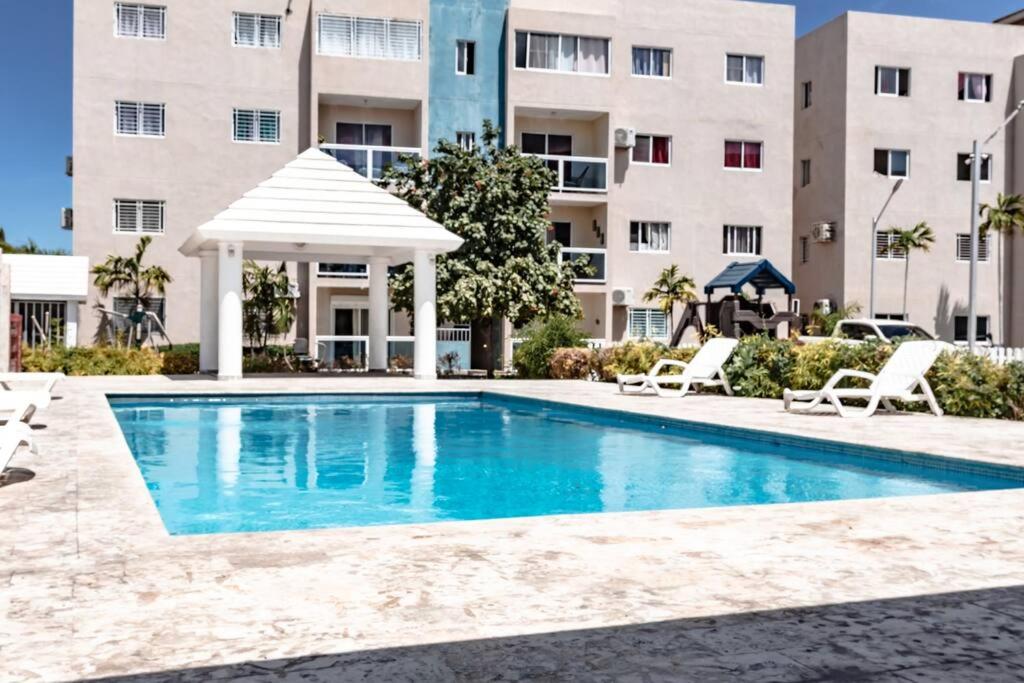 Bazén v ubytování Apartamento en la Romana 600 metros de la playa nebo v jeho okolí