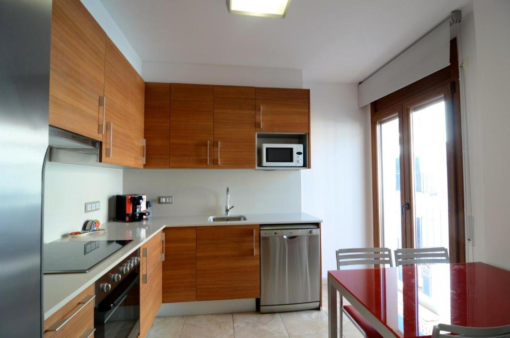 Kuchyňa alebo kuchynka v ubytovaní Gracia - apartamentos