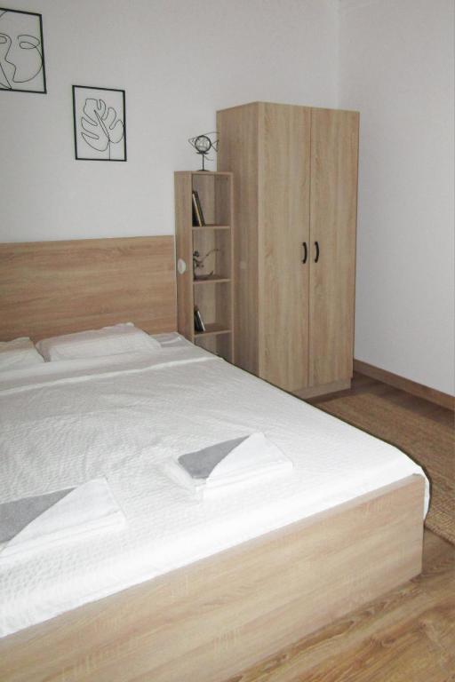 Postel nebo postele na pokoji v ubytování OBALA apartman