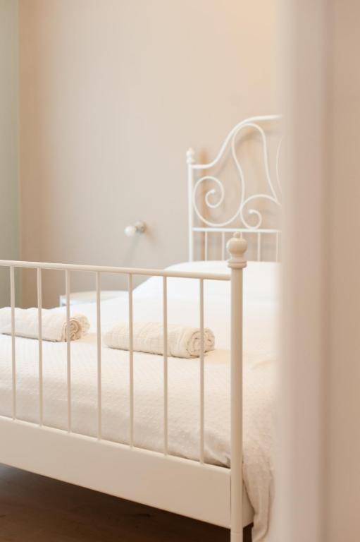 Postel nebo postele na pokoji v ubytování Three Rooms Alghero