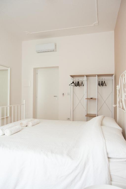 Postel nebo postele na pokoji v ubytování Three Rooms Alghero