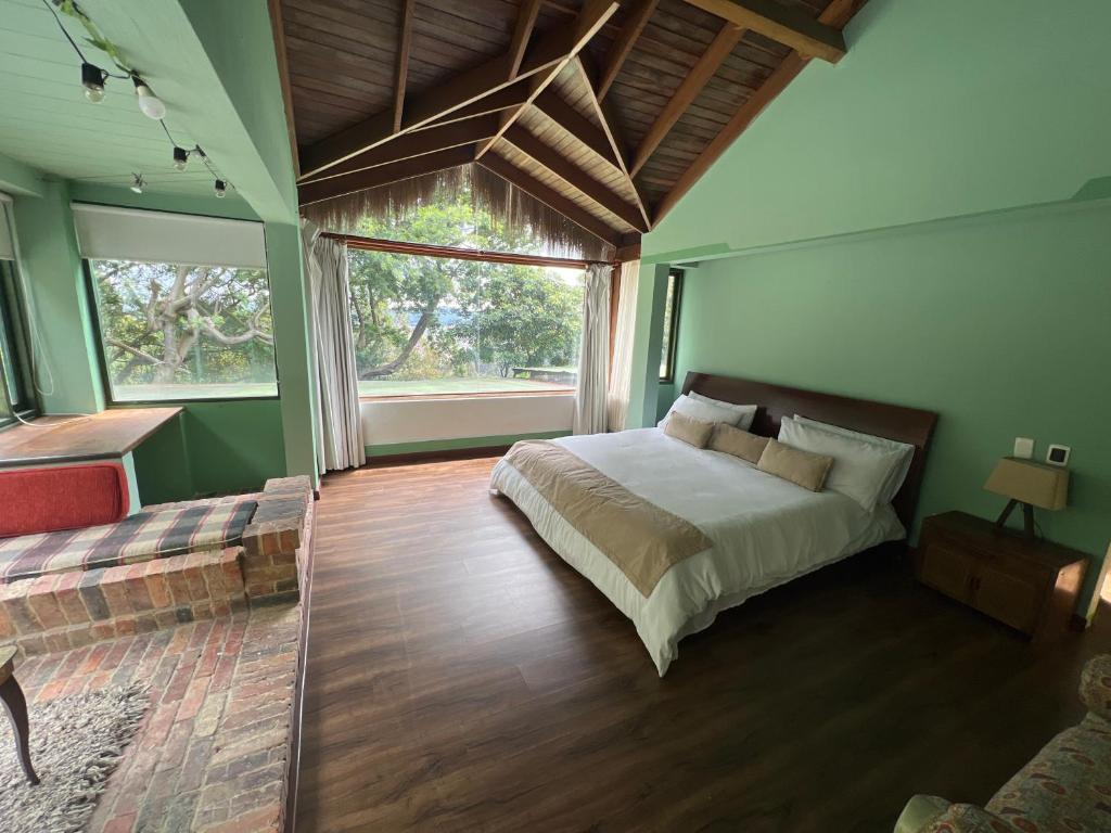 Katil atau katil-katil dalam bilik di Hotel Monteluna