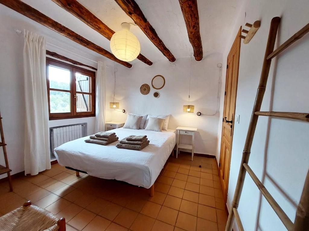 Postel nebo postele na pokoji v ubytování B&B Mas del Pi