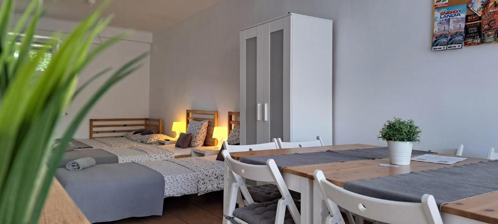 Posteľ alebo postele v izbe v ubytovaní Apartament Na Szkolnej