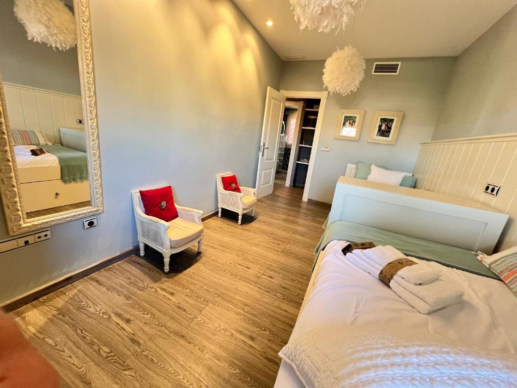 Posteľ alebo postele v izbe v ubytovaní PUSHE Penthouse Playa Granada Beach & Golf 2