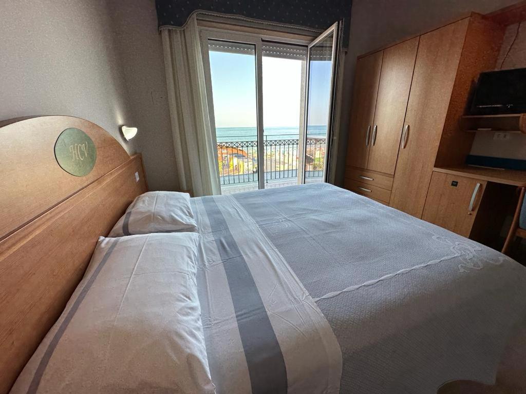 Postel nebo postele na pokoji v ubytování Hotel Costa Verde