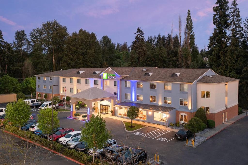 an aerial view of a hotel with a parking lot at Holiday Inn Express Bothell, an IHG Hotel in Bothell
