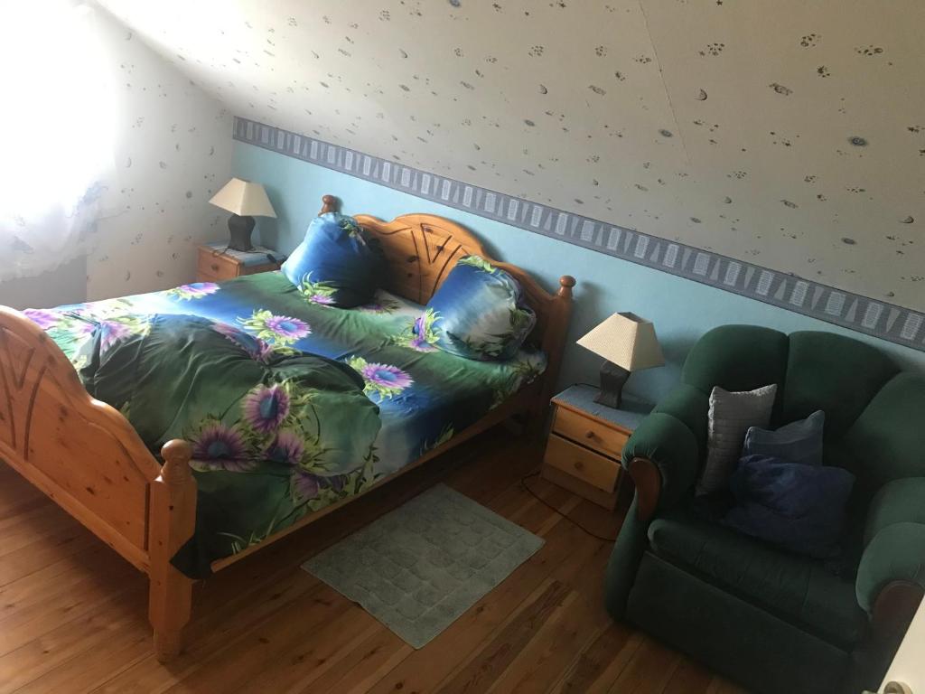 En eller flere senger på et rom på Braun's Summer House