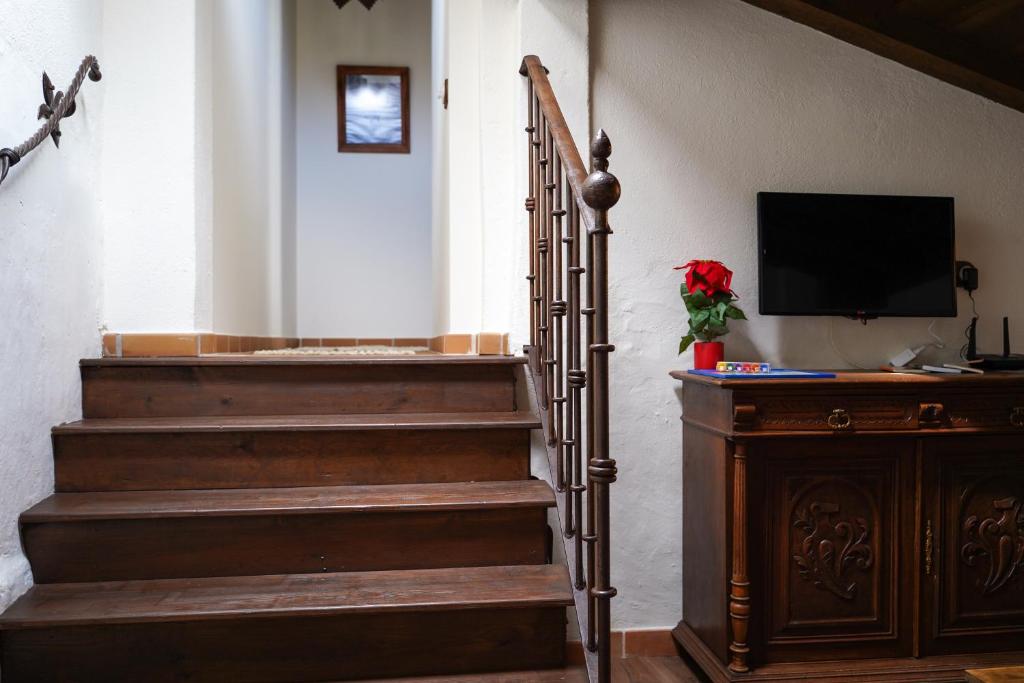 TV a/nebo společenská místnost v ubytování La casa de la abuela Amalia