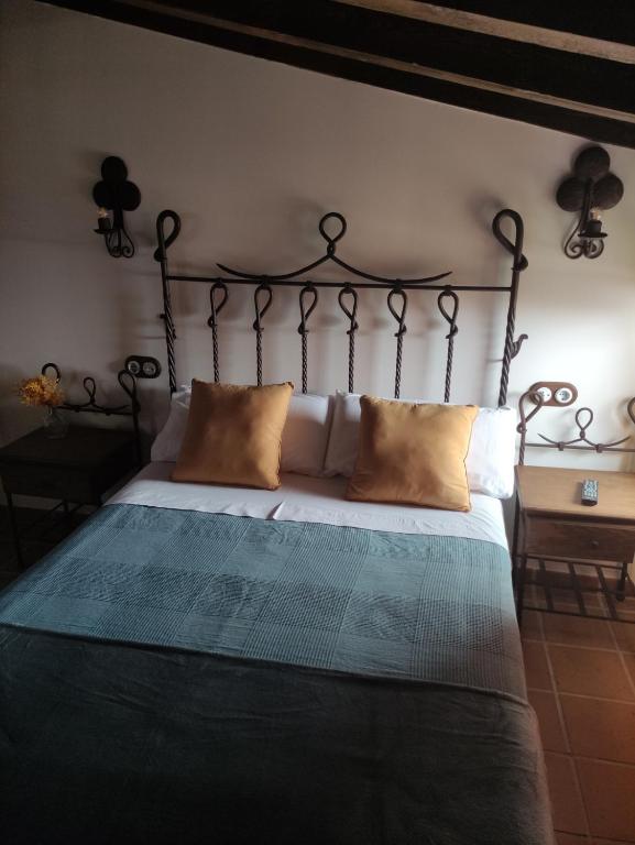 Postel nebo postele na pokoji v ubytování La casa de la abuela Amalia