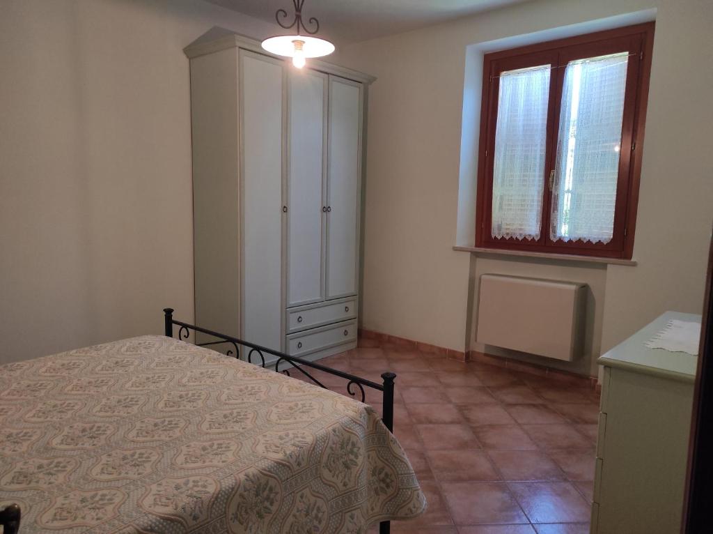 Postel nebo postele na pokoji v ubytování Il Colombaiolo