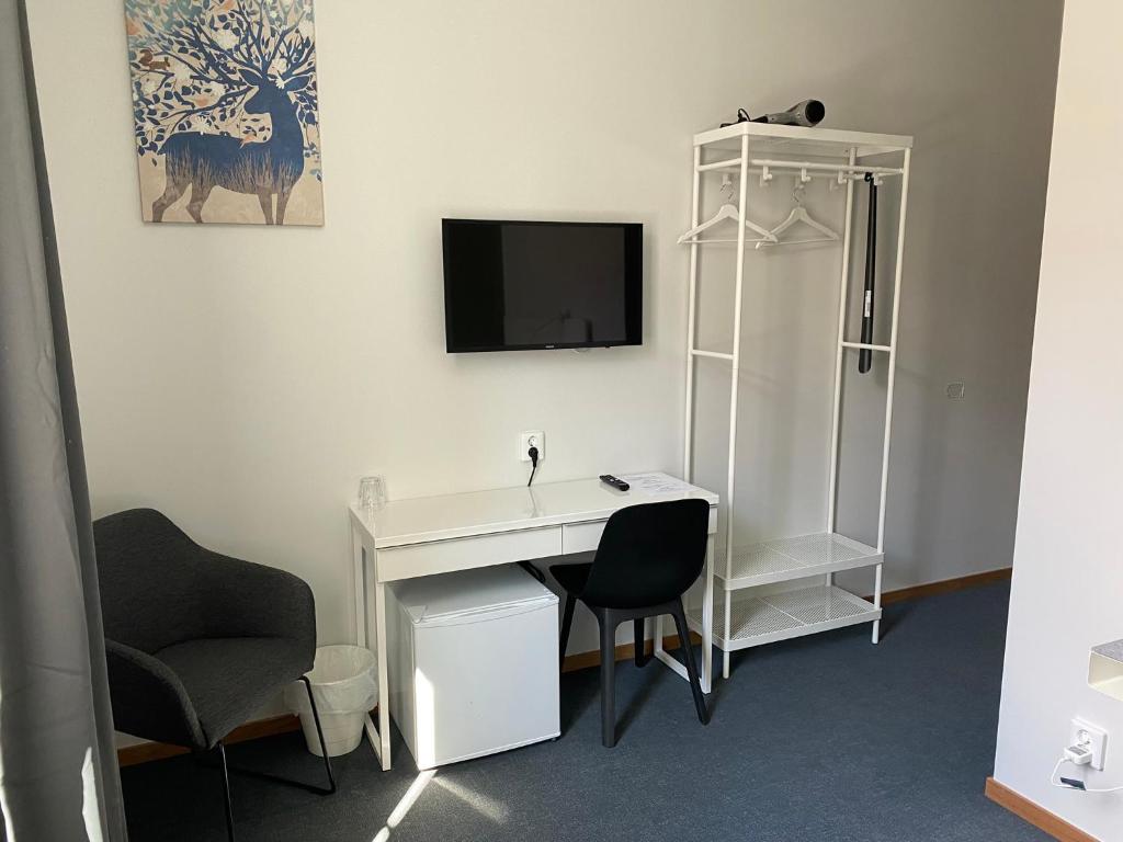 TV a/nebo společenská místnost v ubytování Ahlgrens Hotell Bed & Breakfast