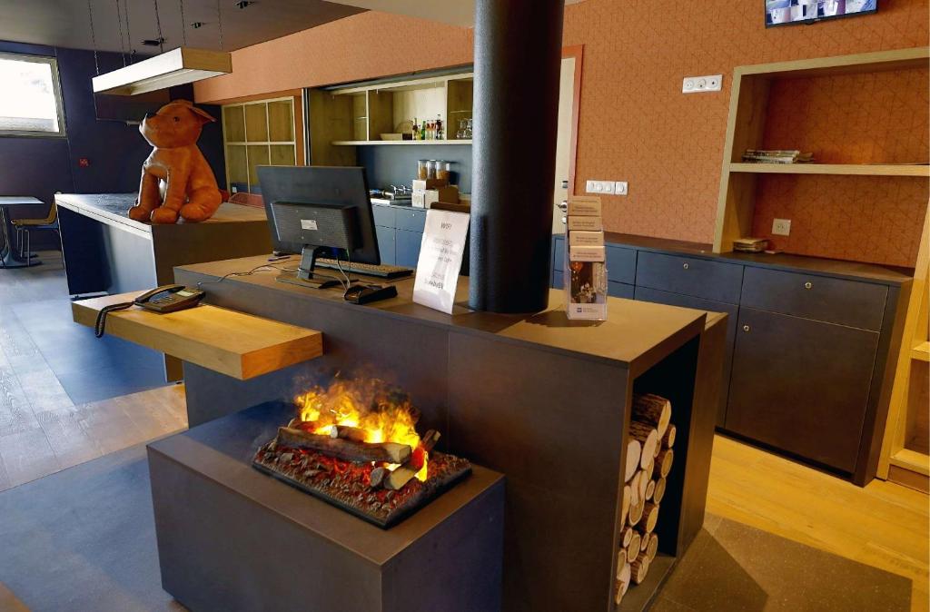 TV a/nebo společenská místnost v ubytování Sure Hotel by Best Western Dole