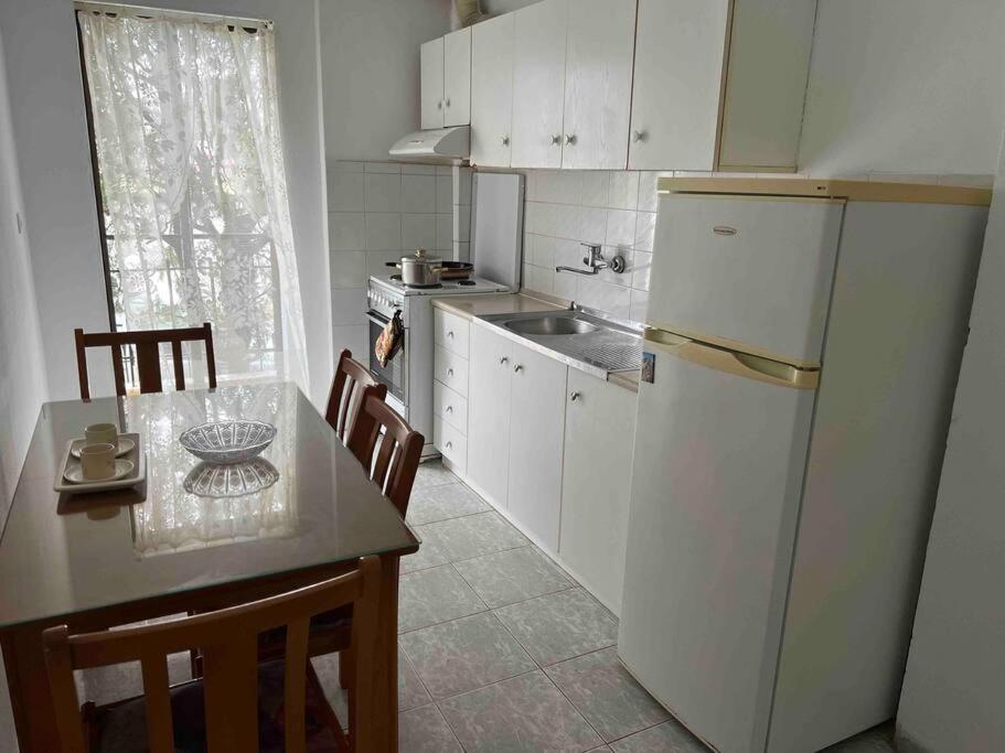Kuchyň nebo kuchyňský kout v ubytování John apartment