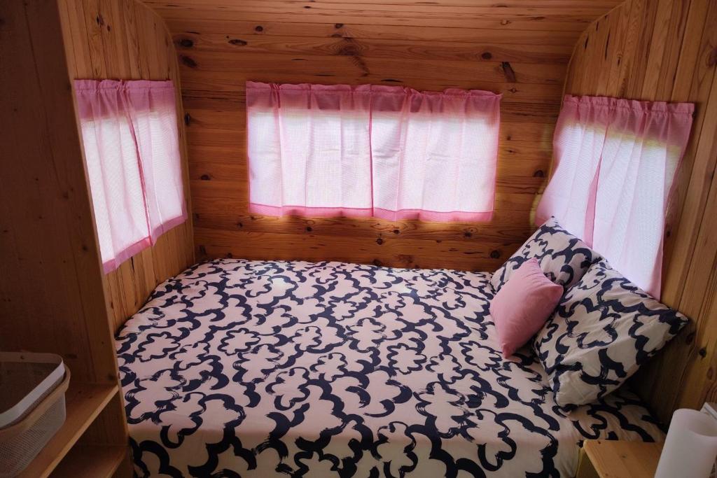 Postel nebo postele na pokoji v ubytování Camping Colombres