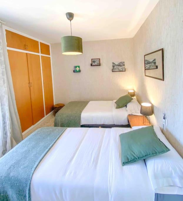Postel nebo postele na pokoji v ubytování Típica Casa Andorrana en Encamp l by BonesVacances