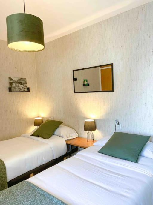 Postel nebo postele na pokoji v ubytování Típica Casa Andorrana en Encamp l by BonesVacances