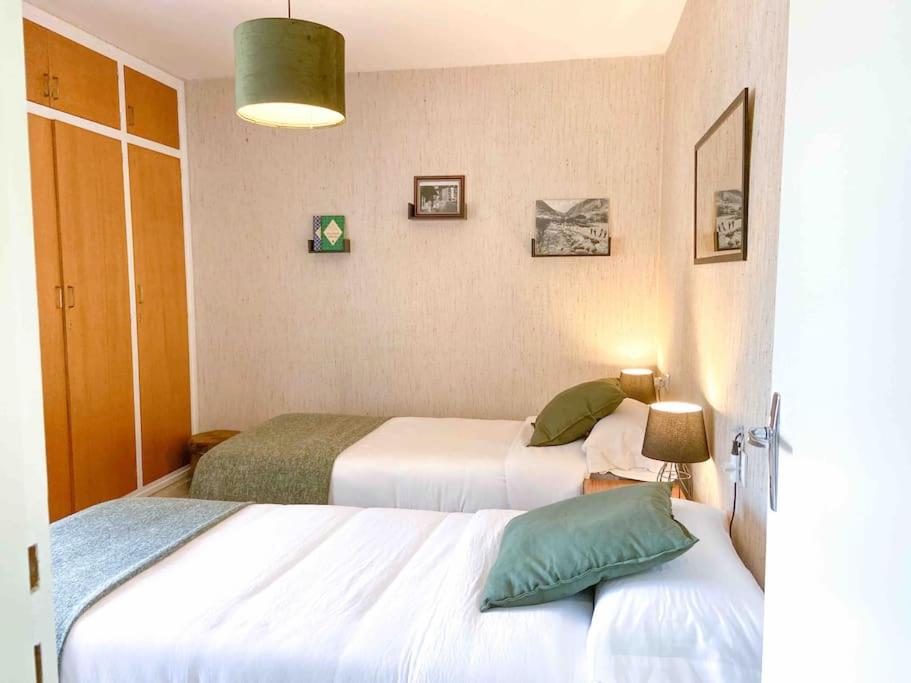 Postel nebo postele na pokoji v ubytování Típica Casa Andorrana en Encamp l by BonesVacances