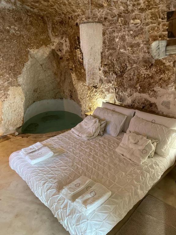 Postel nebo postele na pokoji v ubytování Alkimia
