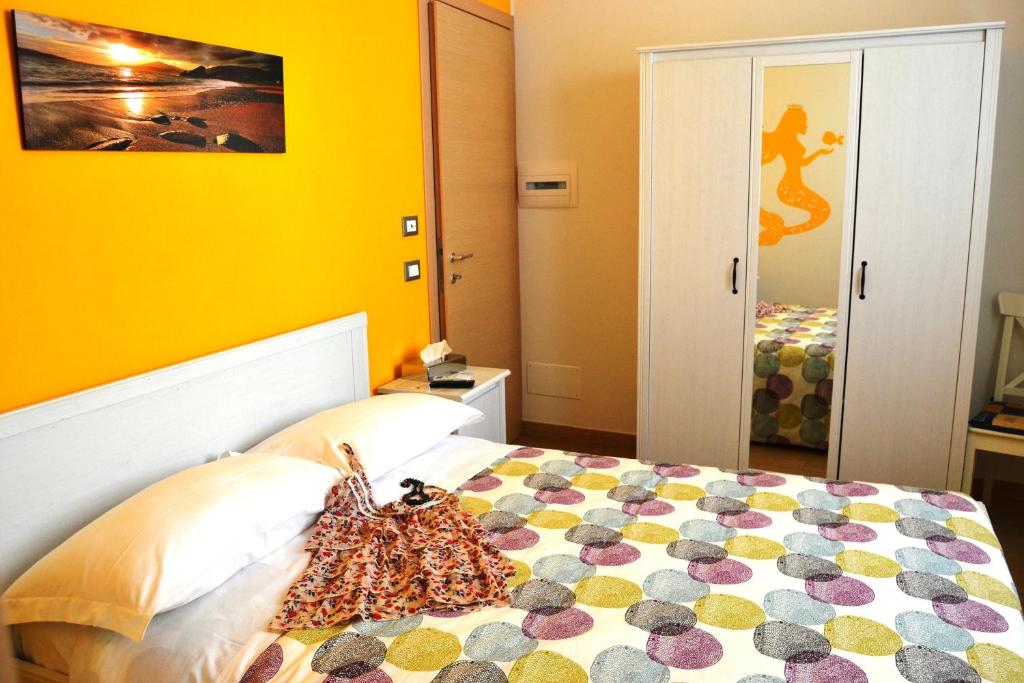 Posteľ alebo postele v izbe v ubytovaní B&B Vivere il Mare