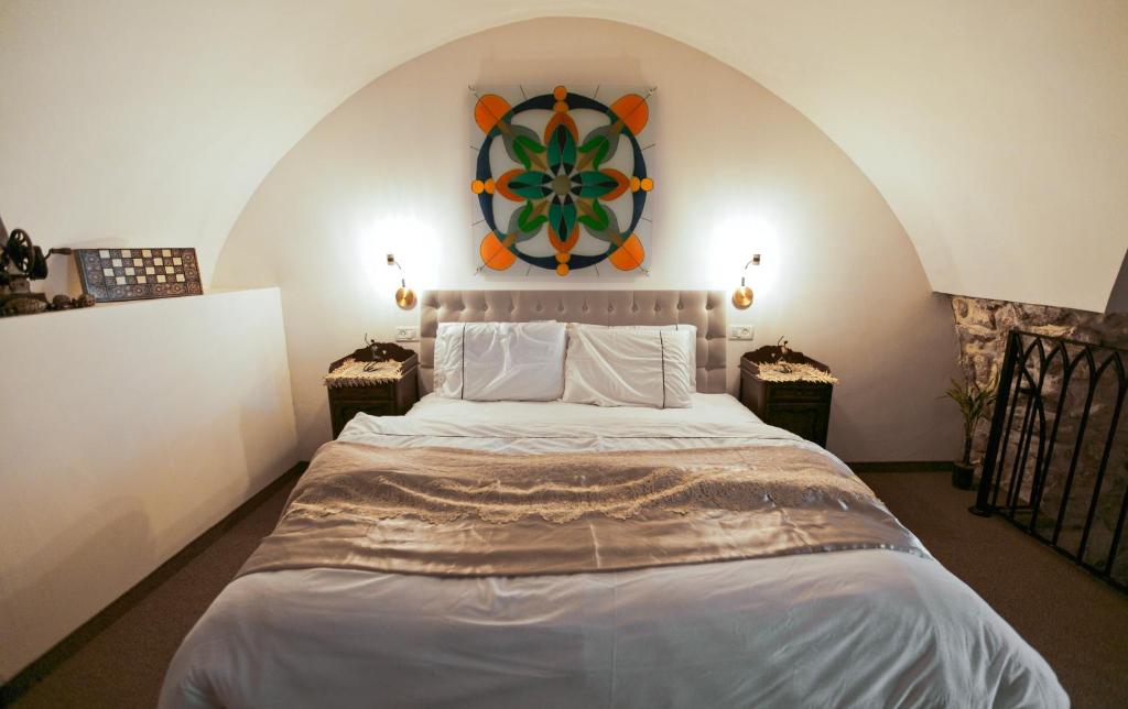 Postel nebo postele na pokoji v ubytování Templars suite
