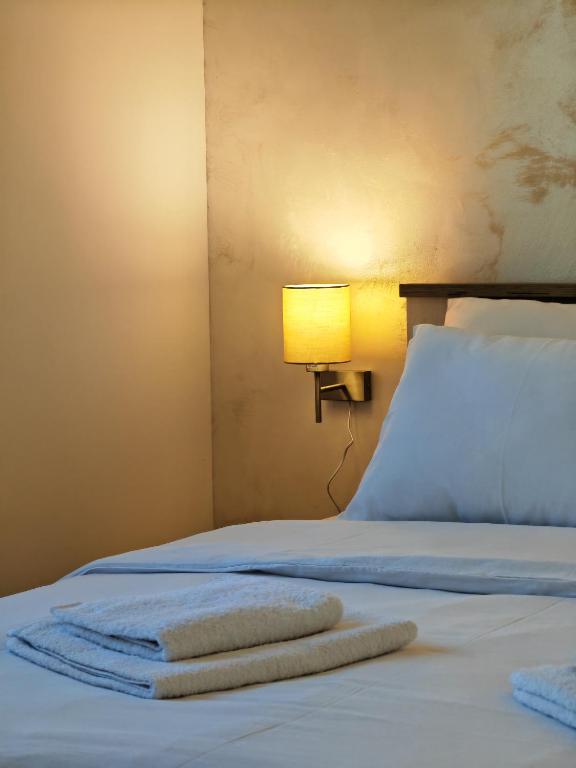Postel nebo postele na pokoji v ubytování Apartman Holiday 1