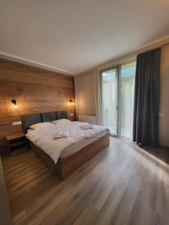Postel nebo postele na pokoji v ubytování Mestia Roots