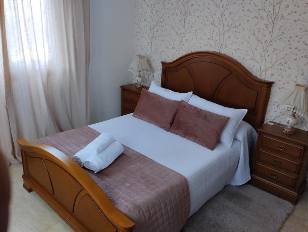 A bed or beds in a room at Casa Xarreiro