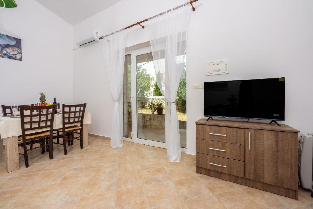 TV a/nebo společenská místnost v ubytování Apartment David