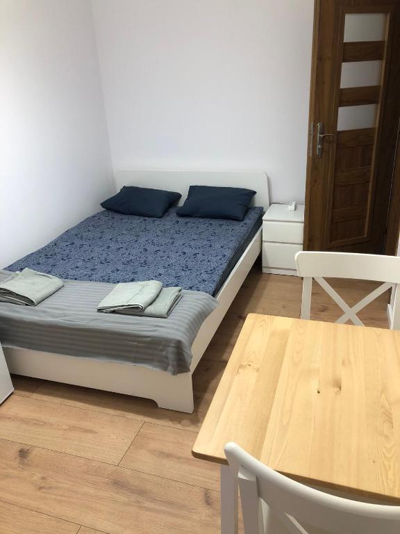 Postel nebo postele na pokoji v ubytování Kapitan Czarnobrody