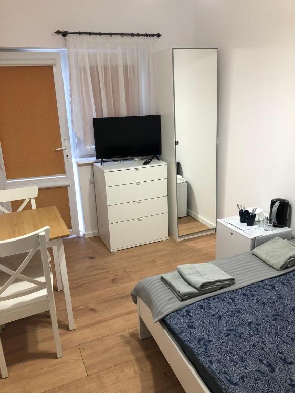 TV a/nebo společenská místnost v ubytování Kapitan Czarnobrody