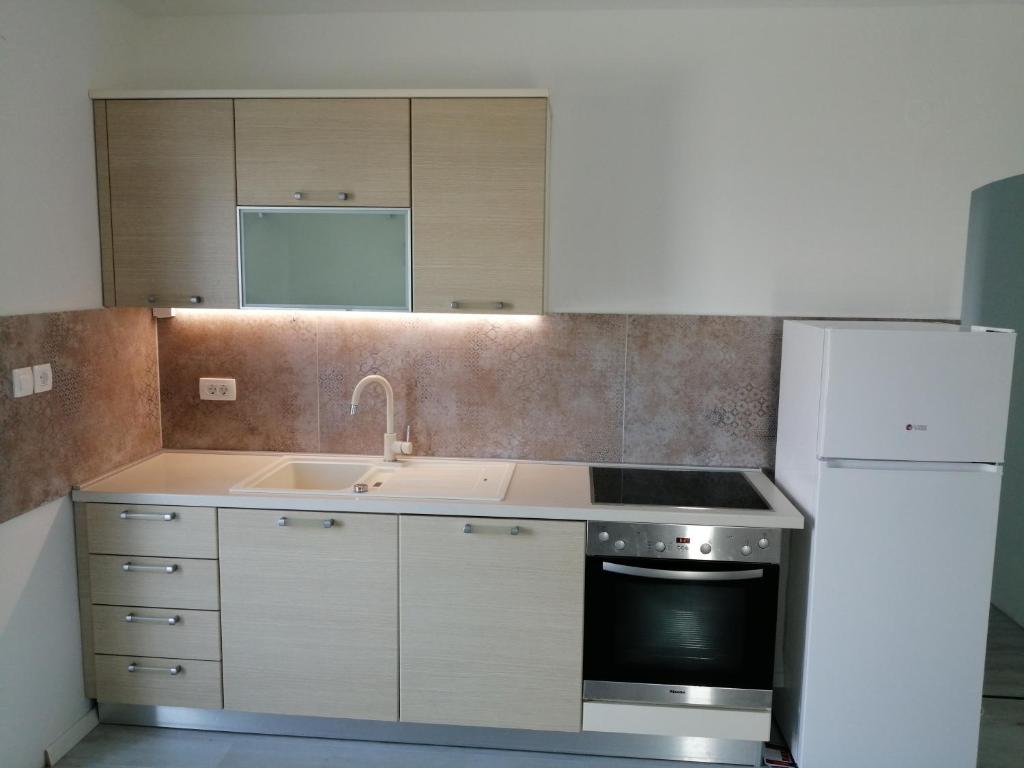 Kuchyň nebo kuchyňský kout v ubytování Apartments with parking spaces Zman, Dugi otok - 449
