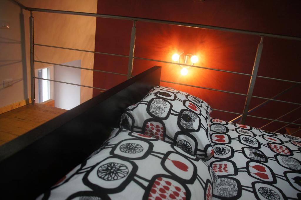 Łóżko lub łóżka w pokoju w obiekcie Casa vacanze Albano