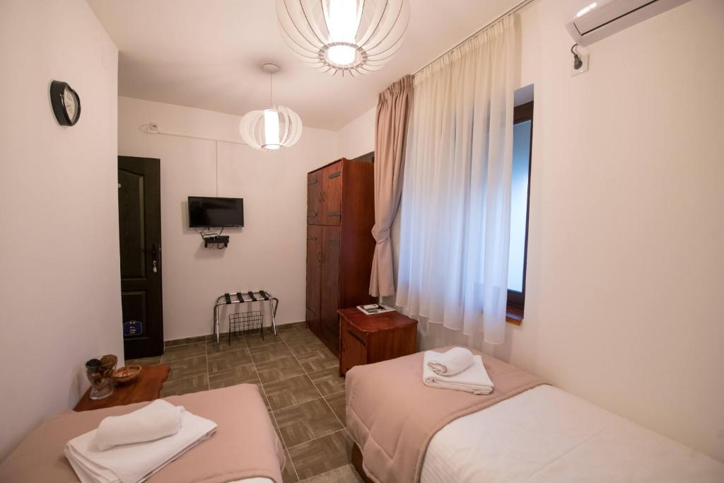 Postel nebo postele na pokoji v ubytování Gardoš rooms