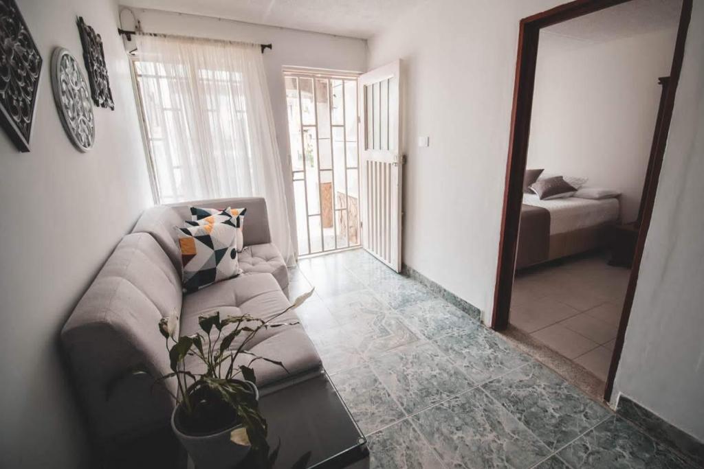 Postel nebo postele na pokoji v ubytování CASA SANTA CIRCASIA