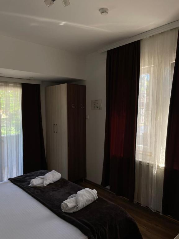 Postel nebo postele na pokoji v ubytování Motel & Restaurant Dar