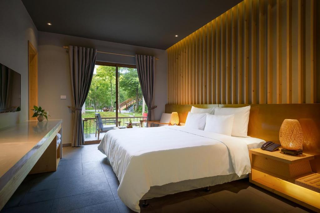 Phòng Premium Deluxe Giường Đôi - Trị Liệu Bấm Huyệt Hằng Ngày Và Suối Nước Nóng