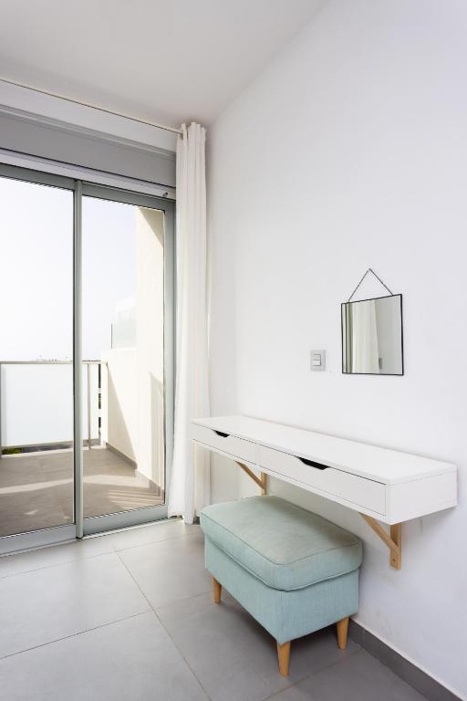Posedenie v ubytovaní Apartamentos Las Terrazas de Sotavento