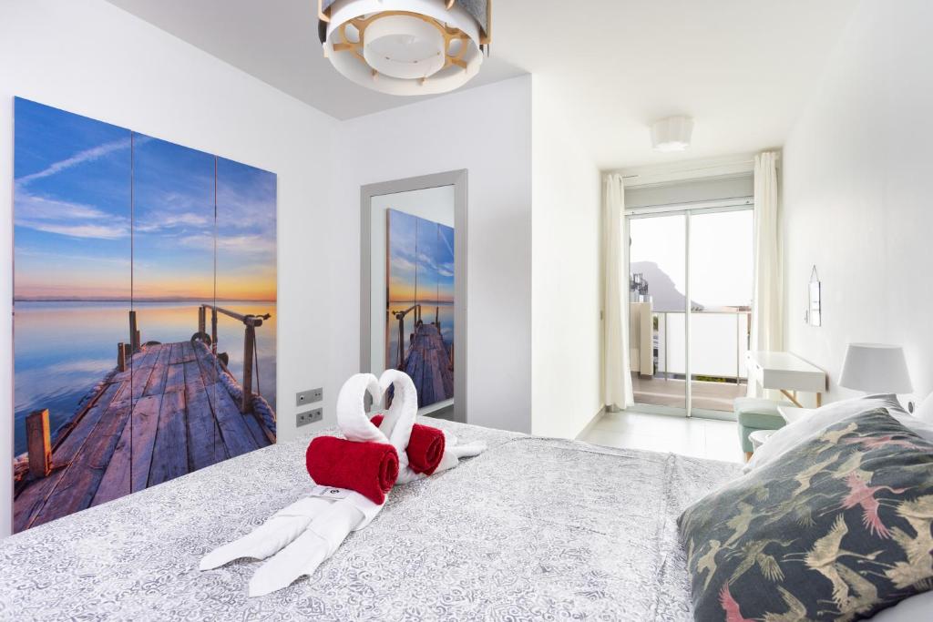 Posteľ alebo postele v izbe v ubytovaní Apartamentos Las Terrazas de Sotavento