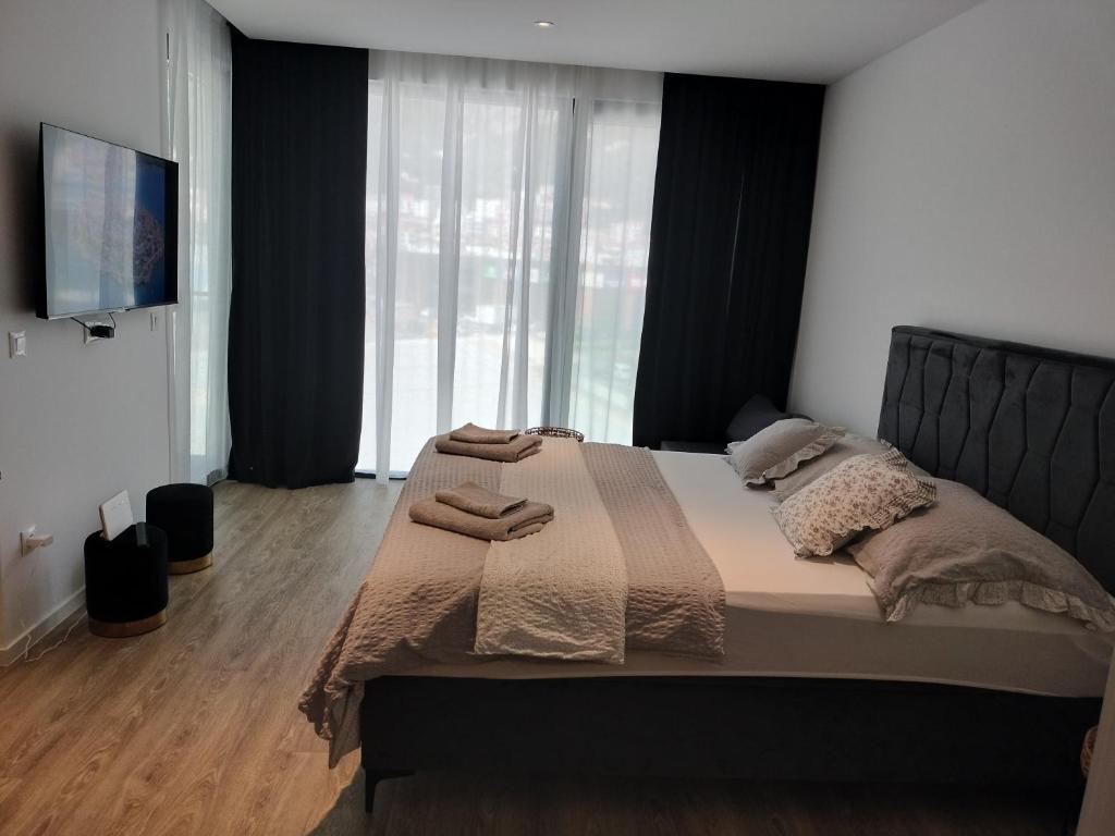 Posteľ alebo postele v izbe v ubytovaní Kaja Home