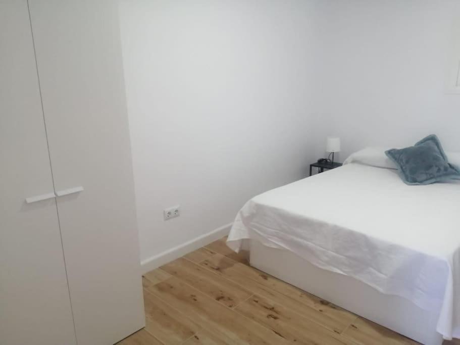 Ένα ή περισσότερα κρεβάτια σε δωμάτιο στο Apartamento/Flat San Fernando Cádiz