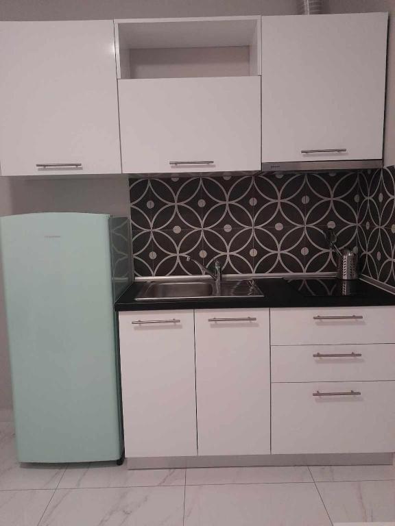 Sinodinos Deluxe Apartments - Economy Triple Room